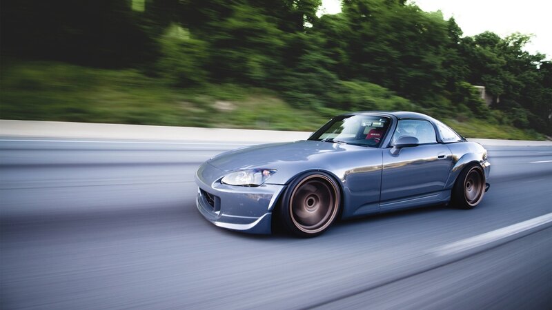silver sports car in motion