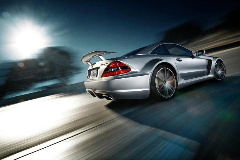 silver sports car in motion