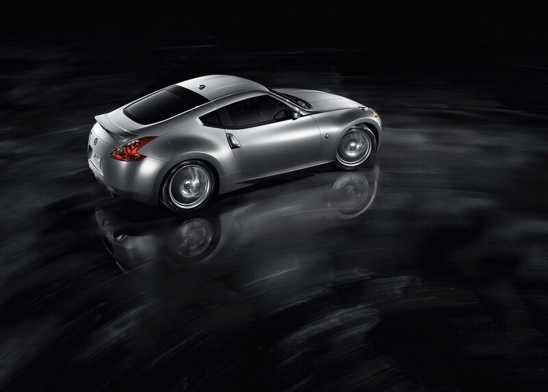 Silver sports car in motion
