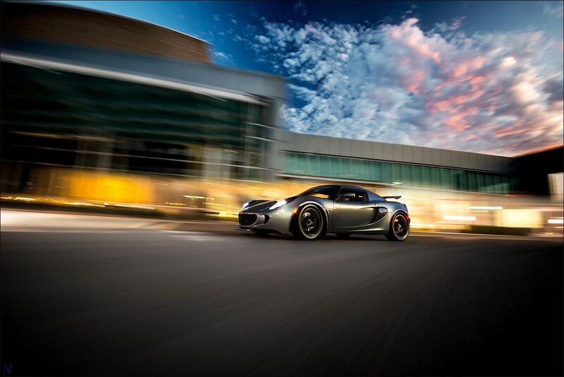 Silver sports car in motion
