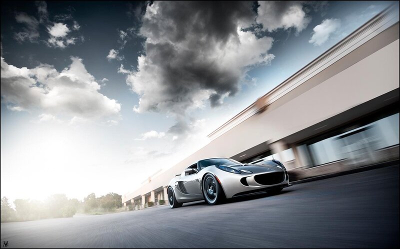 silver sports car in motion