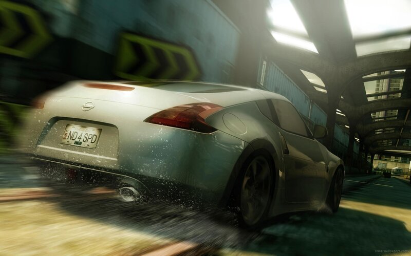 Silver sports car in motion