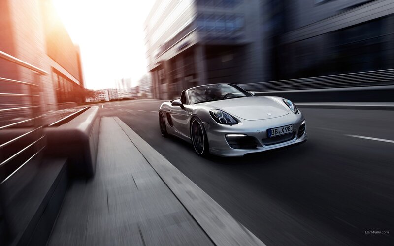 silver sports car in motion