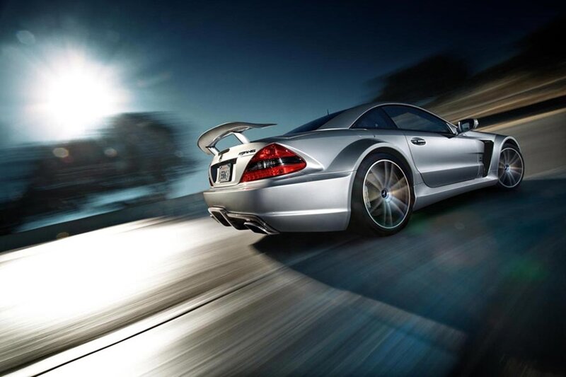 silver sports car in motion