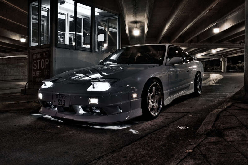 Silver sports car in parking garage