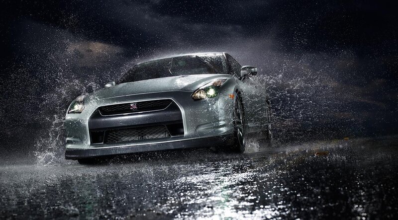 Silver sports car in rain