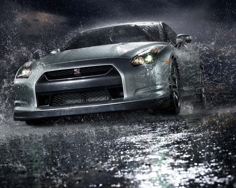 Silver sports car in rain