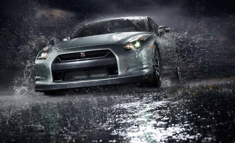 Silver sports car in rain