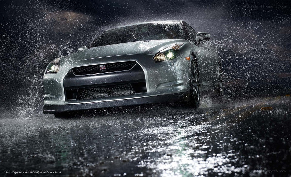 Silver sports car in rain
