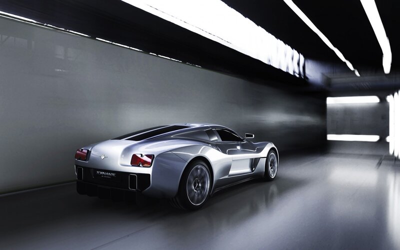 Silver sports car in tunnel