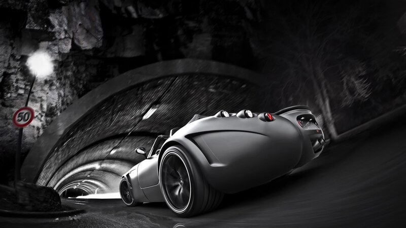 Silver sports car in tunnel