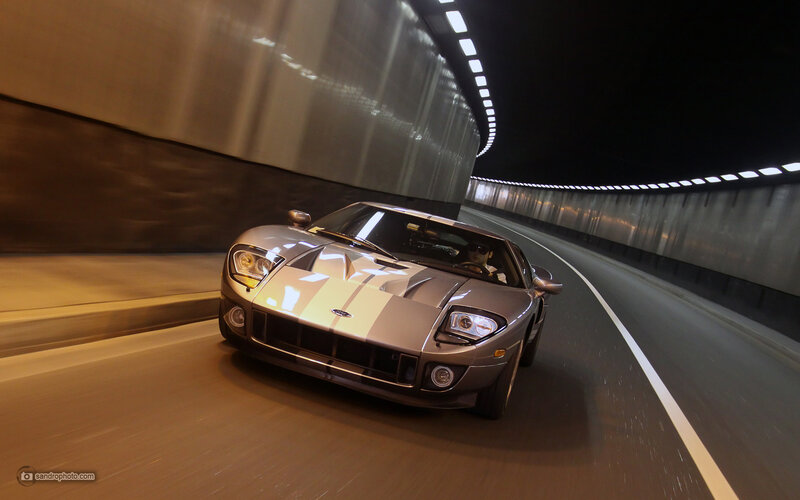 silver sports car in tunnel