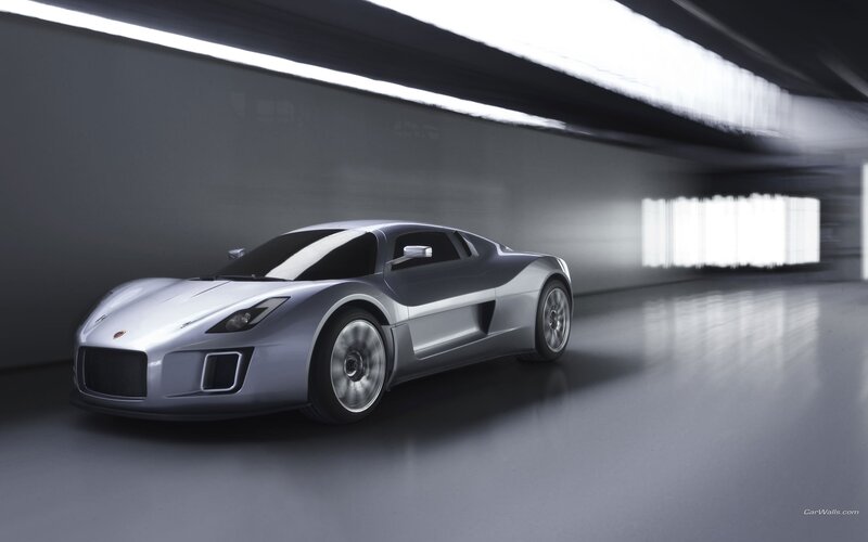 silver sports car in tunnel