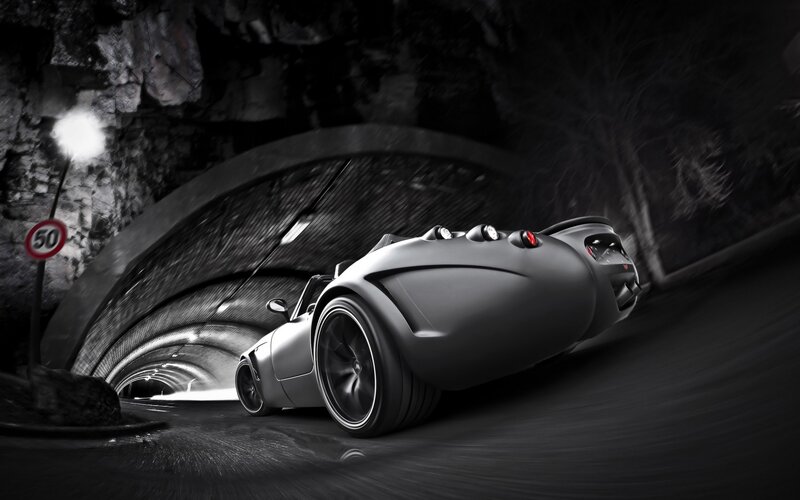 Silver sports car in tunnel