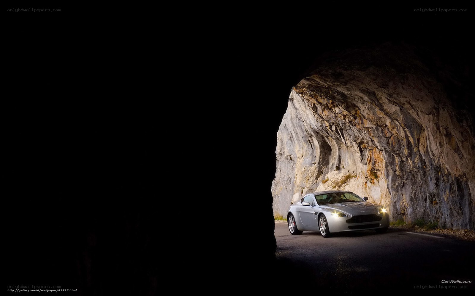 silver sports car in tunnel