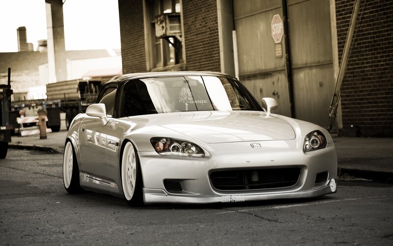 silver sports car in urban setting