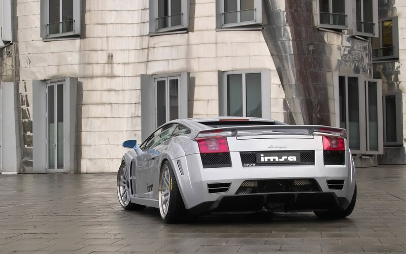 silver sports car in urban setting