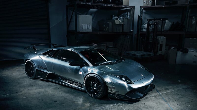 silver sports car in warehouse