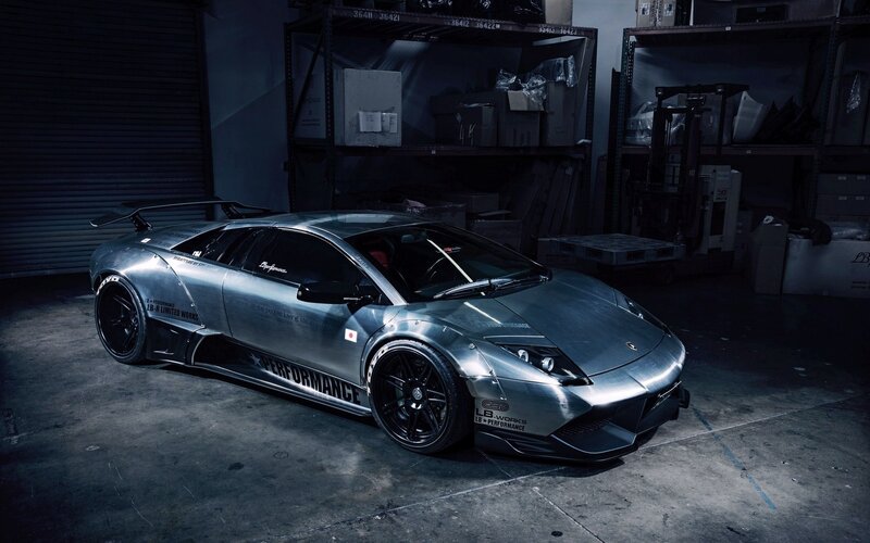 silver sports car in warehouse