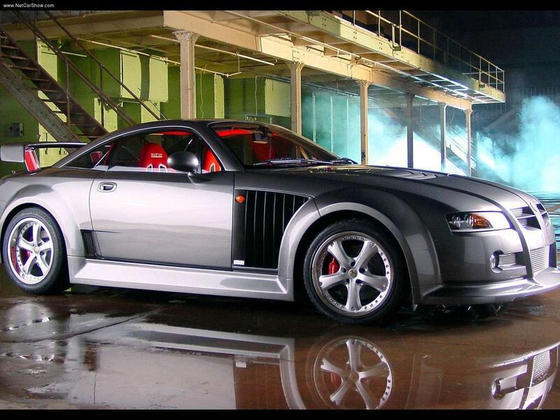 silver sports car in warehouse