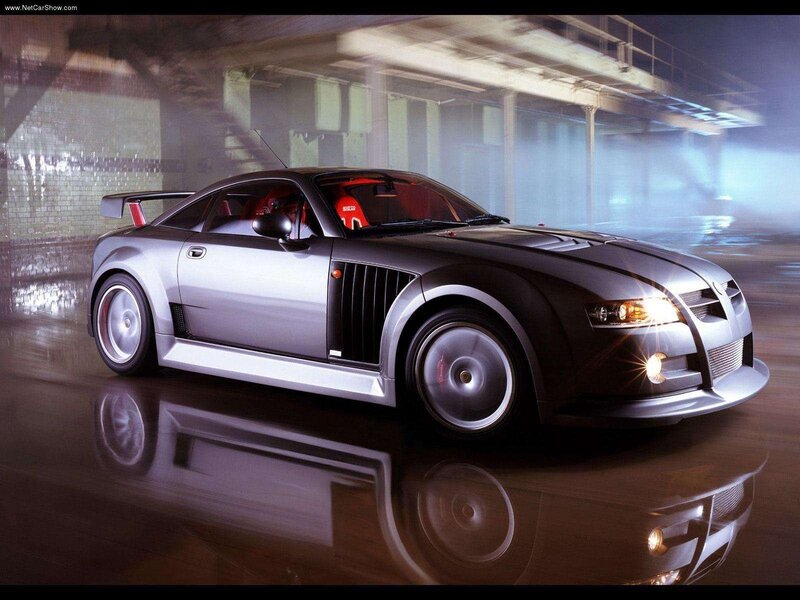 silver sports car in warehouse