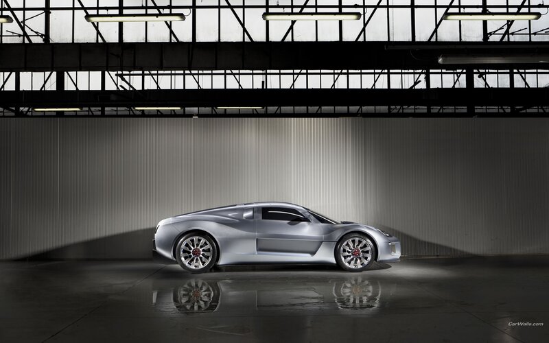 silver sports car in warehouse