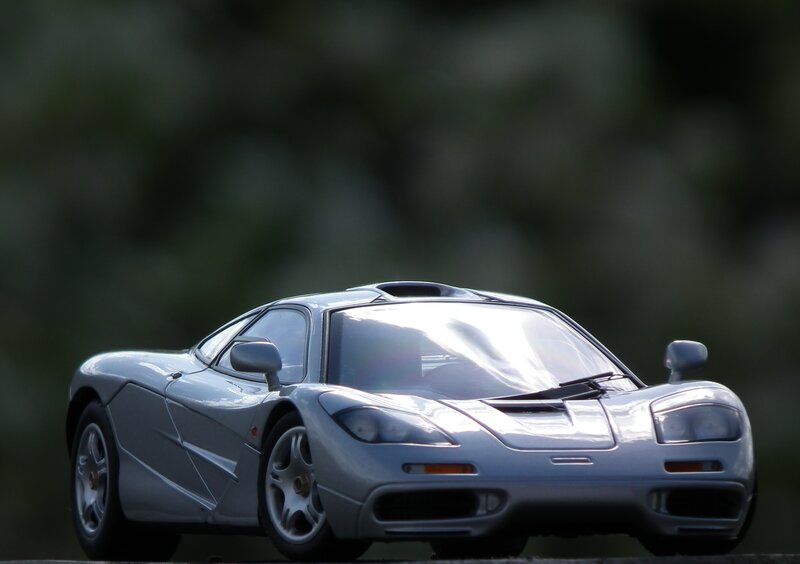 Silver Sports Car Model — Dramatic