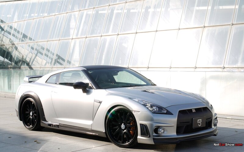 Silver Sports Car — Modern, Afternoon, Photograph, Building, Tire