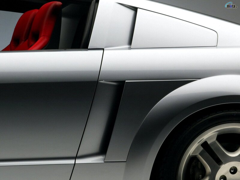 Silver Sports Car — Modern, Photograph, Red Seats, Wheel