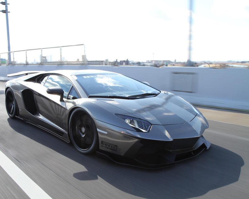 silver sports car on a bridge