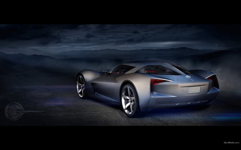 Silver sports car on a dark road