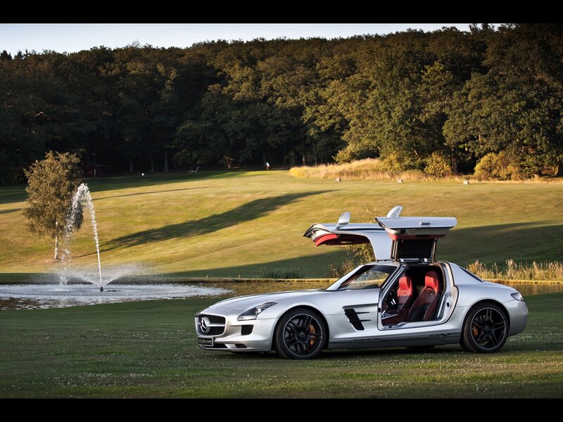 Silver sports car on a golf course