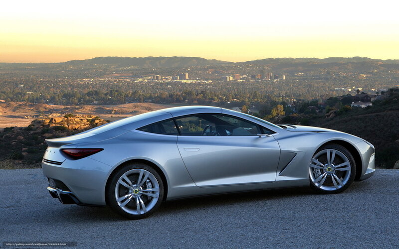 Silver sports car on a hill