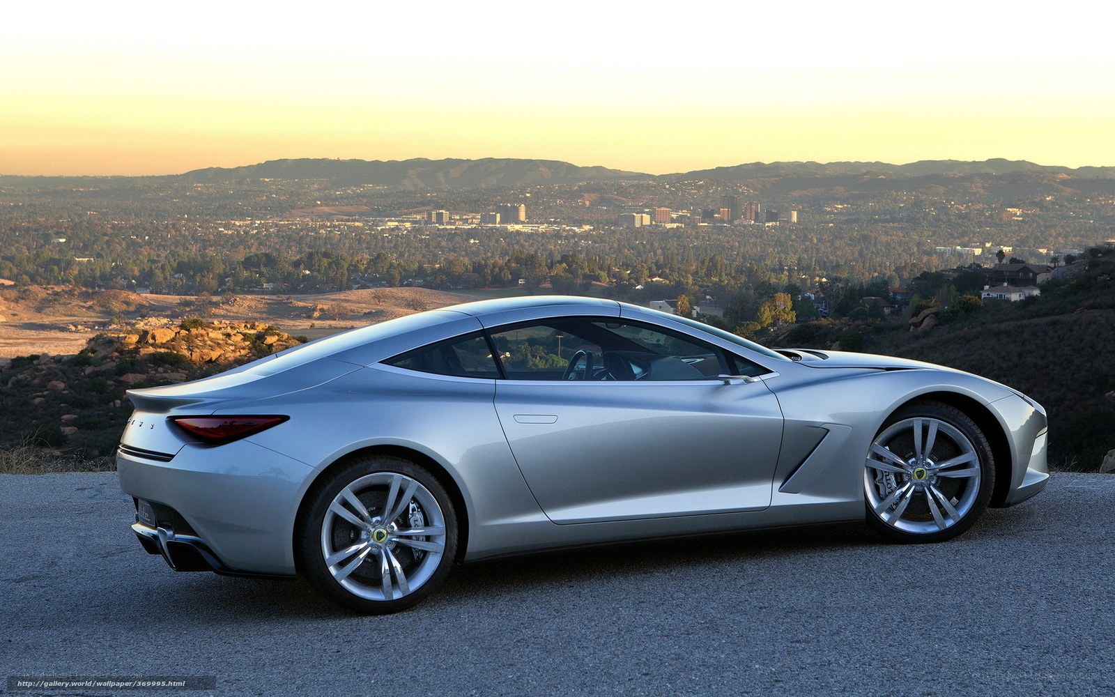 Silver sports car on a hill