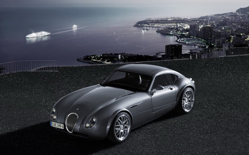Silver sports car on a hill