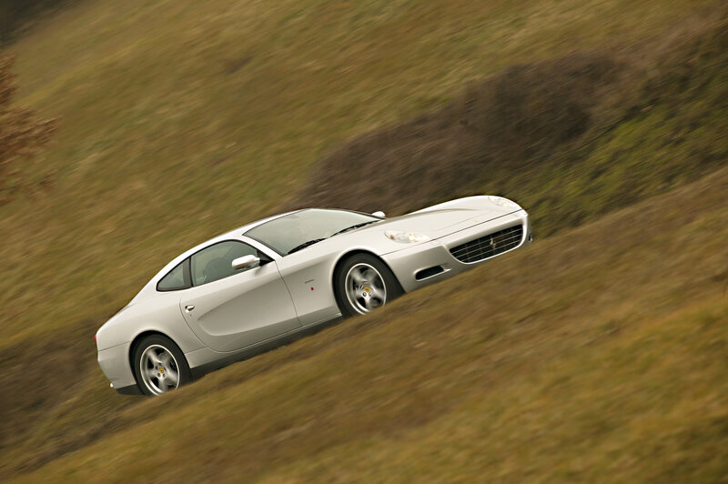 silver sports car on a hill