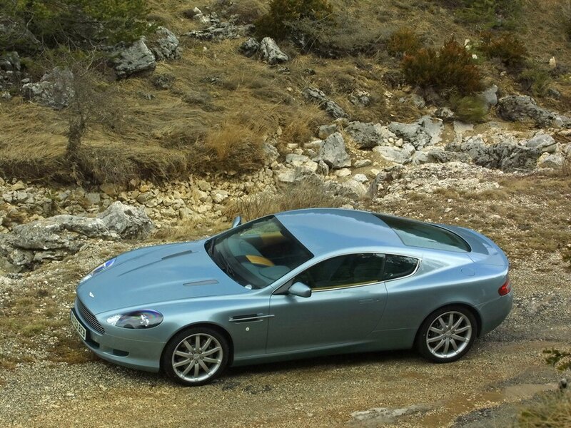 silver sports car on a hill