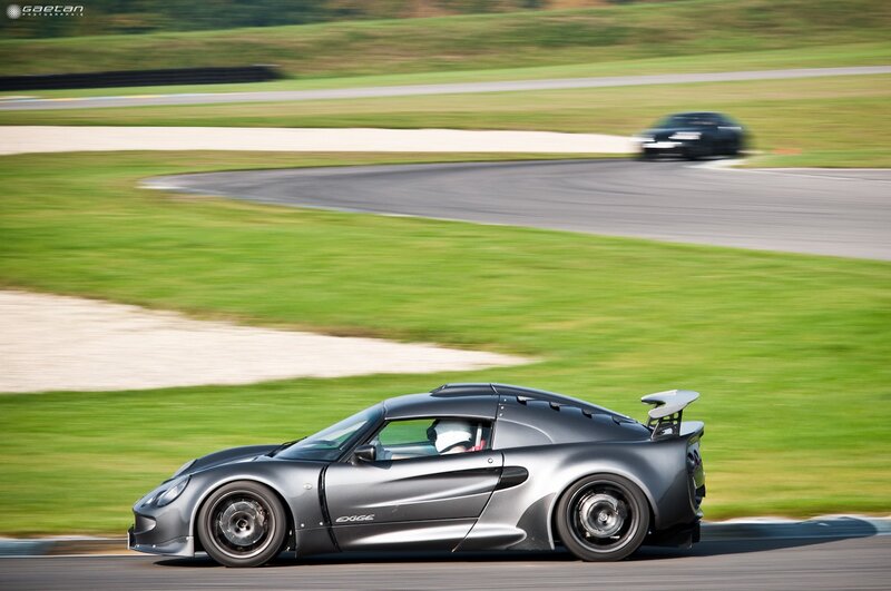 Silver sports car on a racetrack