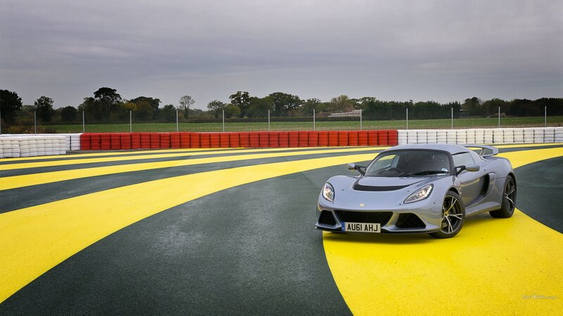 Silver sports car on a racetrack