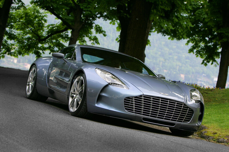 silver sports car on a road