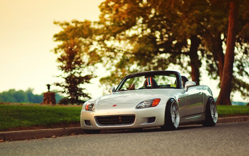 silver sports car on a road