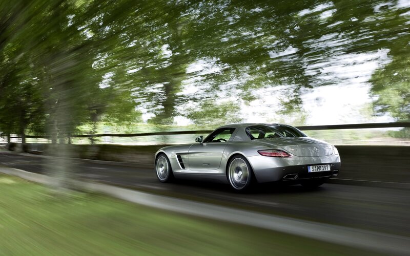 Silver sports car on a road