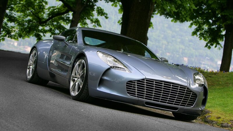 silver sports car on a road