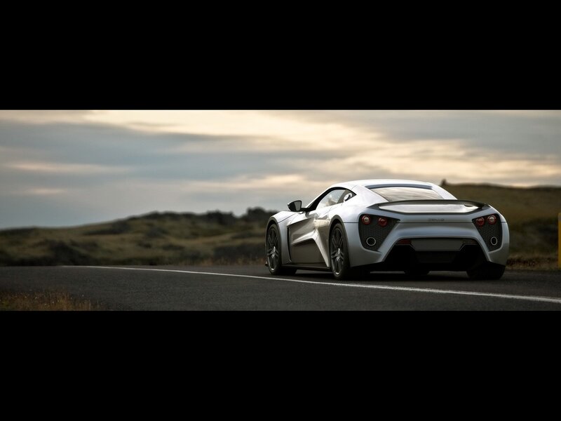 Silver sports car on a road