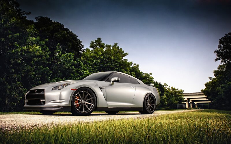 Silver sports car on a road
