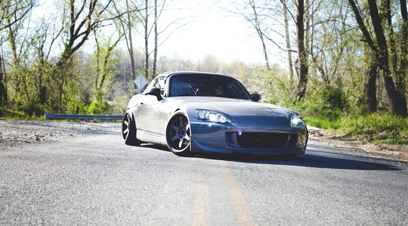 silver sports car on a road