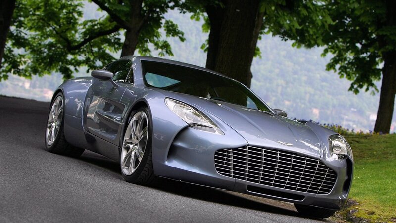 silver sports car on a road