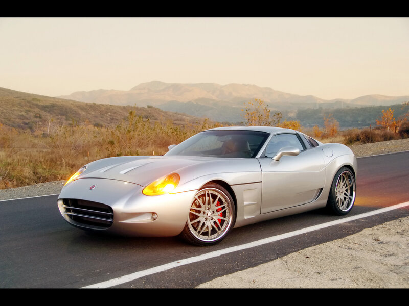Silver sports car on a road