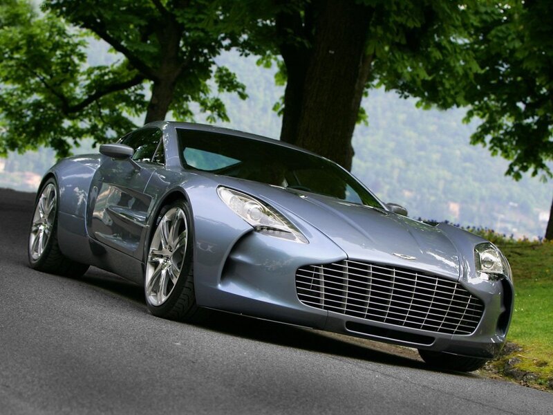silver sports car on a road