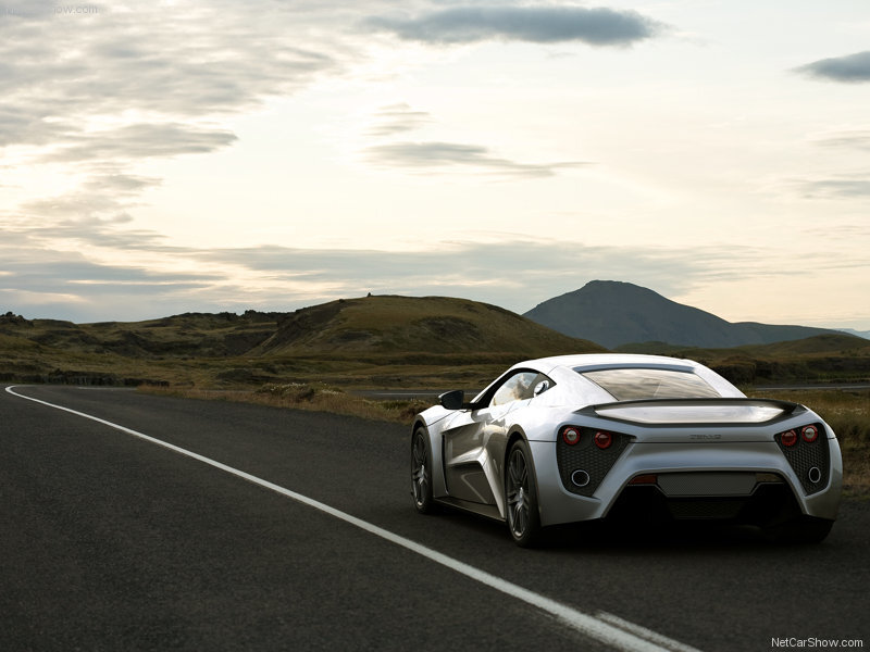 silver sports car on a road